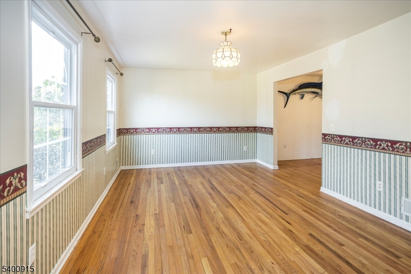 2 Bernard Court Lebanon, NJ 08833 - Photo 7 of 37 a view of empty room with wooden floor and fan