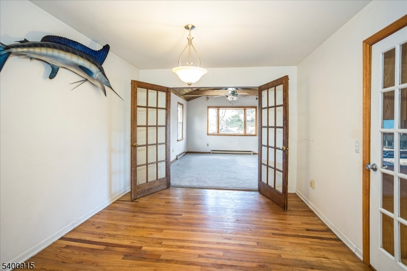 2 Bernard Court Lebanon, NJ 08833 - Photo 8 of 37 a view of an empty room with wooden floor and a window
