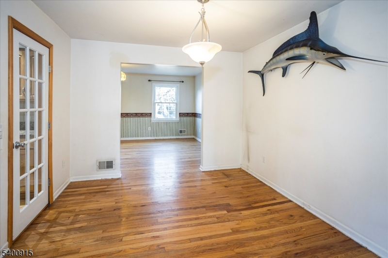 2 Bernard Court Lebanon, NJ 08833 - Photo 9 of 37 a view of a room with wooden floor and windows