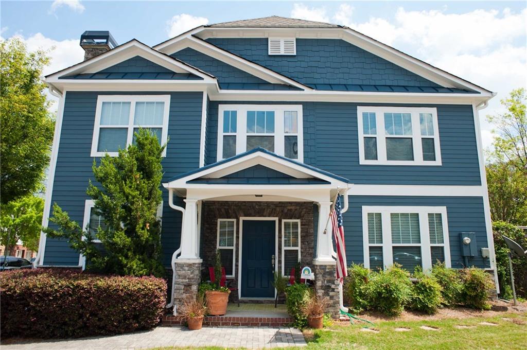 276 16th Street Northwest Atlanta, GA 30318 - Photo 1 of 1 front view of a house with a yard
