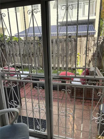 a outdoor space with lots of tables and chairs