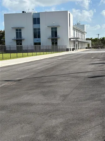 a view of a building with a street