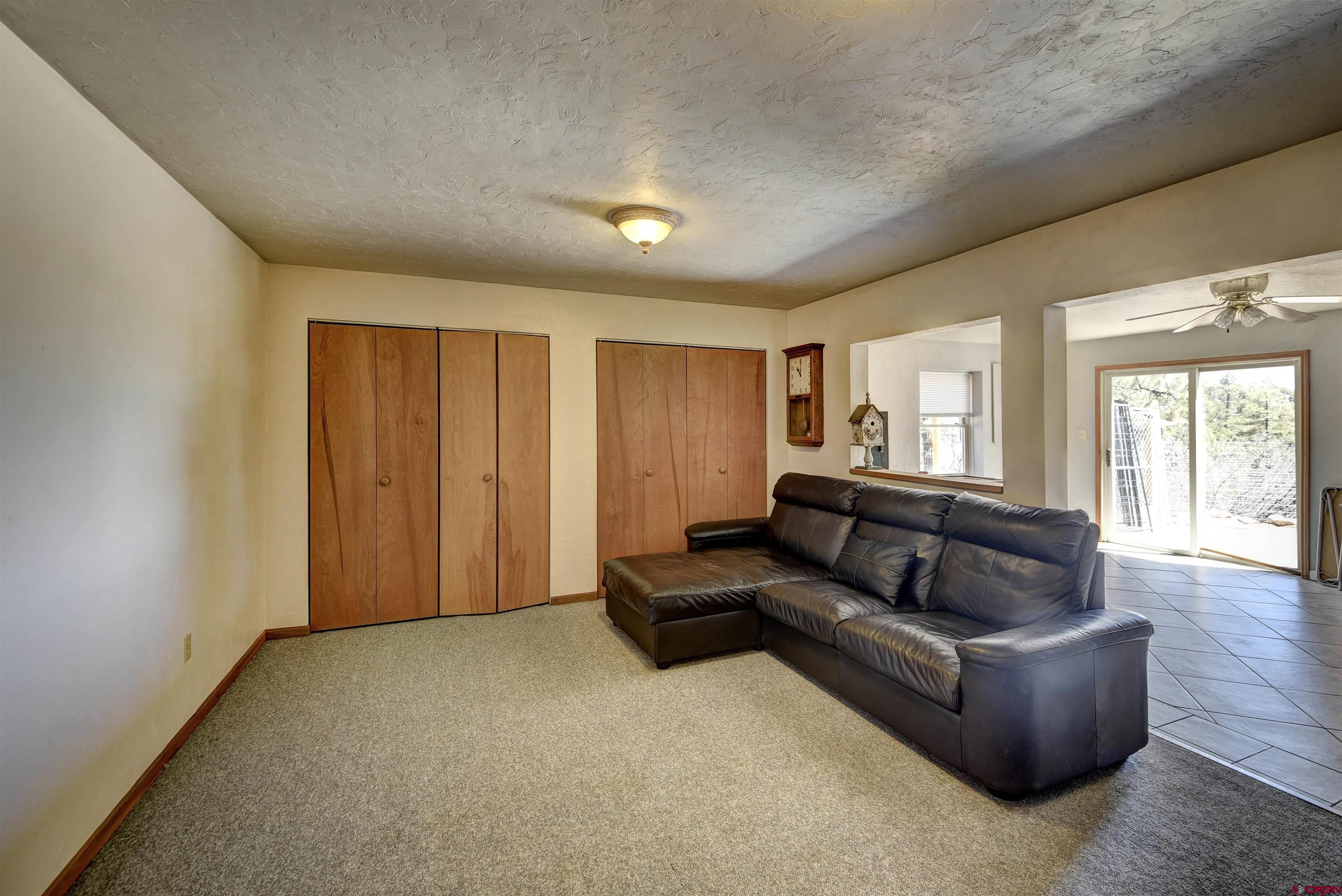 1172 Ridge Road Durango, CO 81303 - Photo 16 of 28 a living room with furniture and a window