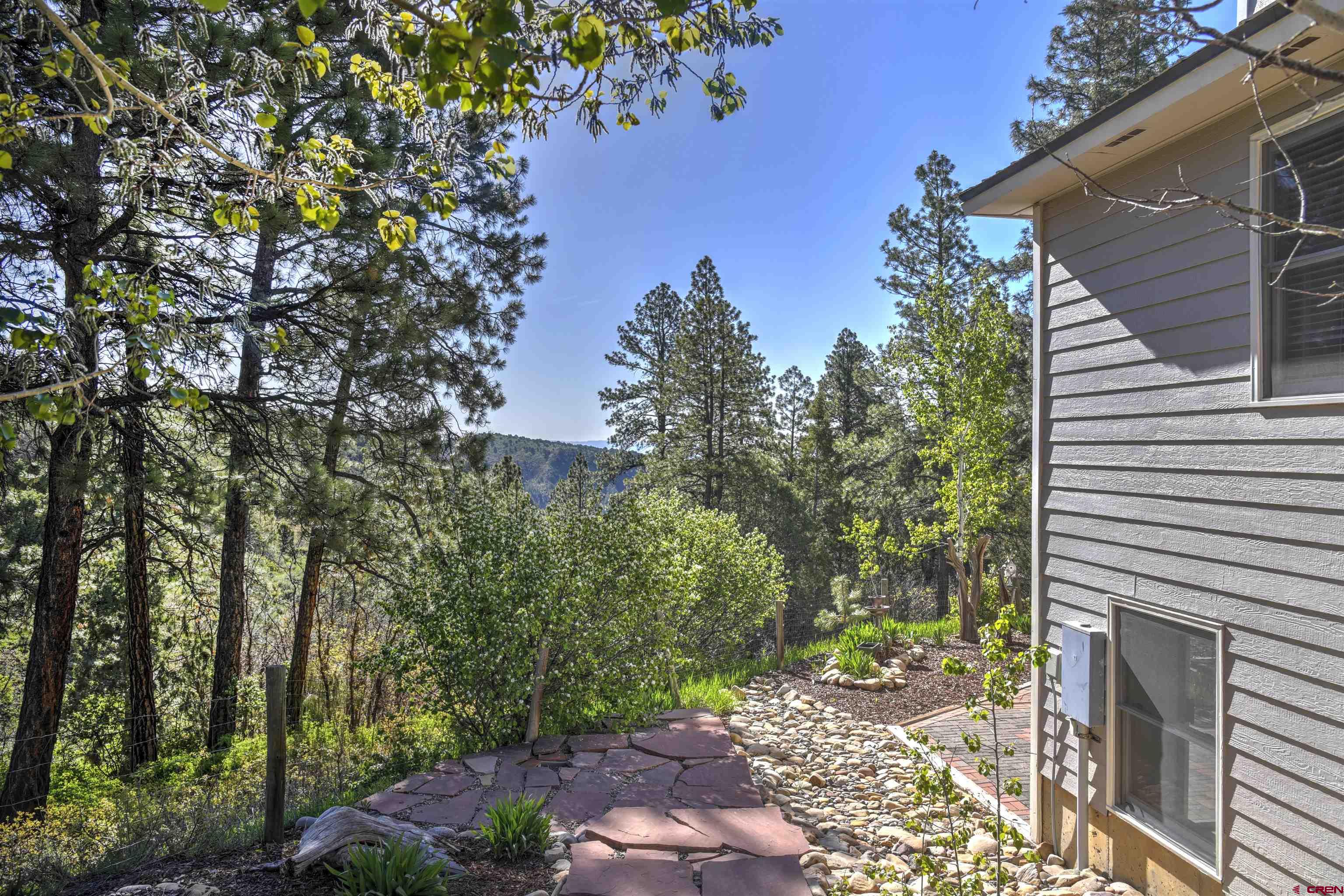 1172 Ridge Road Durango, CO 81303 - Photo 2 of 28 a backyard of a house