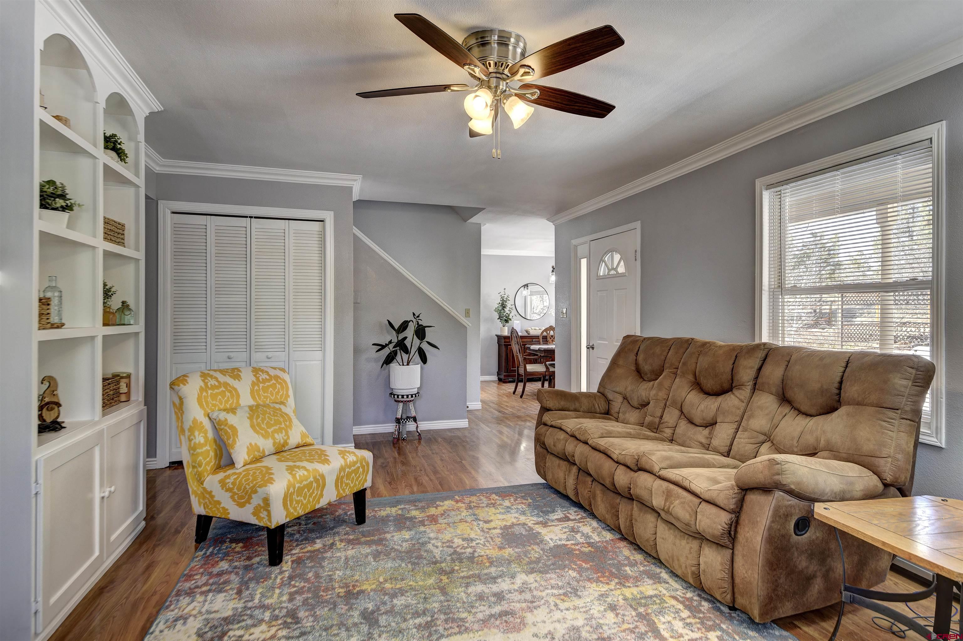 1172 Ridge Road Durango, CO 81303 - Photo 24 of 28 a living room with furniture and a large window