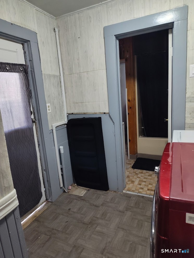 13 Rose Street Norwich, CT 06360 - Photo 6 of 21 a view of front door and stairs