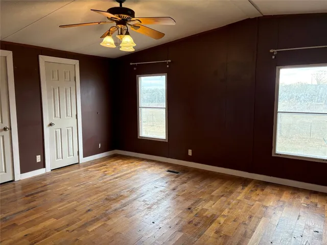 a view of an empty room and window