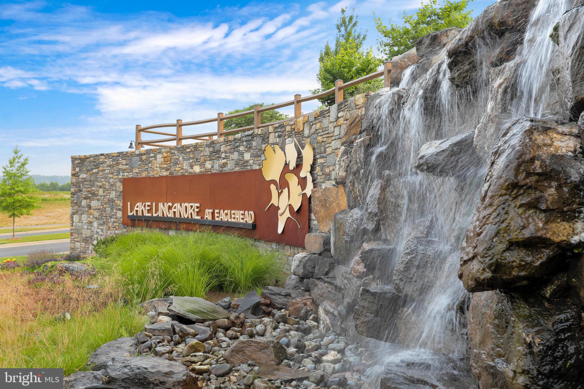 5920 Pecking Stone Street New Market, MD 21774 - Photo 38 of 72 a view of a street with a building in the background