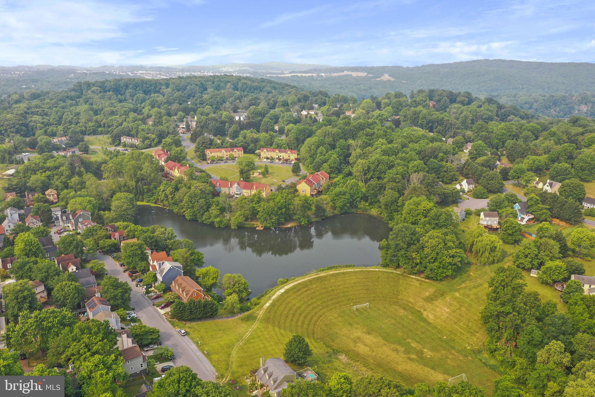 5920 Pecking Stone Street New Market, MD 21774 - Photo 54 of 72 a view of a lake in middle of the town