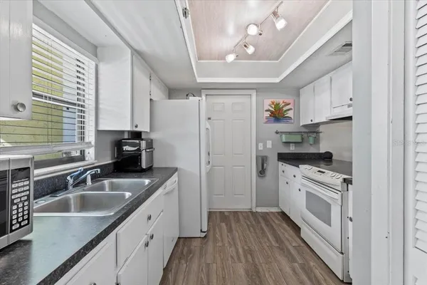 a view of a livingroom with furniture and a fireplace