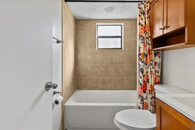 a view of a chairs and table in the patio