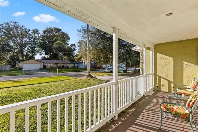 a view of a lake with houses in the back