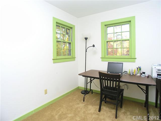 9064 Stacy Howie Road Indian Land, SC 29707 - Photo 12 of 16 a view of a workspace room with furniture and a window