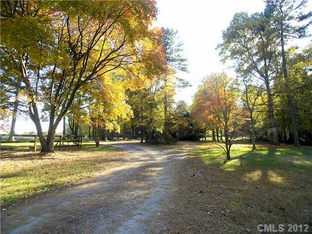 9064 Stacy Howie Road Indian Land, SC 29707 - Photo 4 of 16 a view of a park with large trees