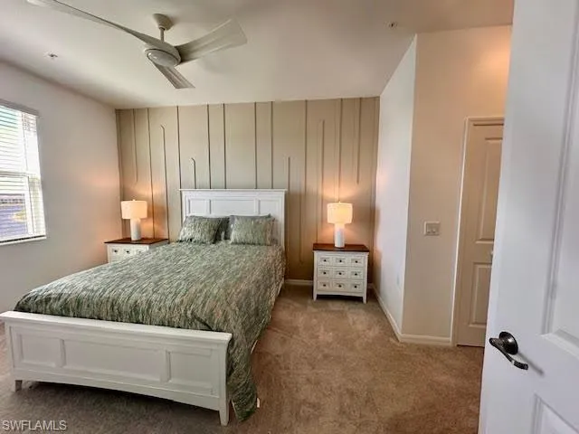 a living room with a bed and furniture