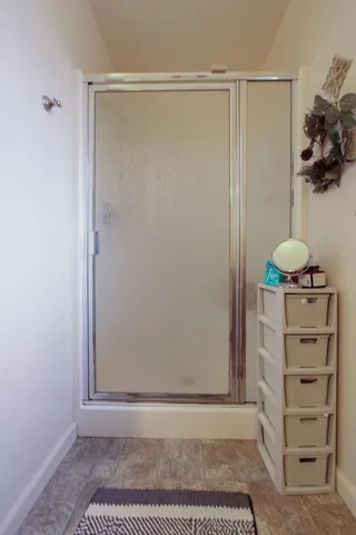 a room with toys and dresser