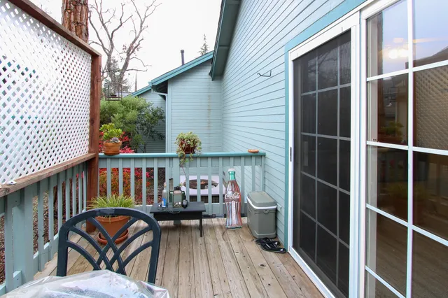 a view of a house with a flower garden