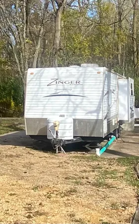 a view of a backyard of the house