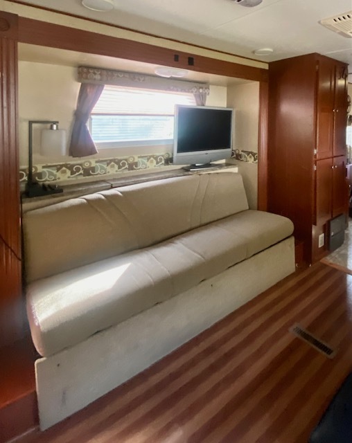 17-100 Woodhaven Sublette, IL 61367 - Photo 6 of 11 a living room with granite countertop furniture and a flat screen tv