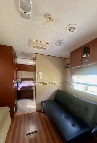 a living room with furniture and a couch