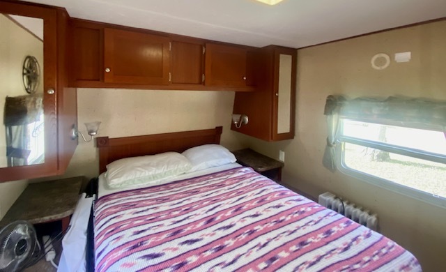 17-100 Woodhaven Sublette, IL 61367 - Photo 9 of 11 a bedroom with a bed and window