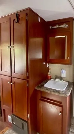 a bathroom with a sink and a mirror