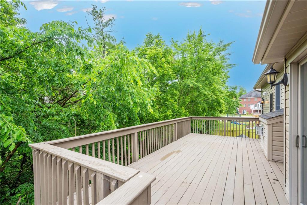 2510 Hilltop Road Presto, PA 15142 - Photo 16 of 36 a view of balcony with small garden and wooden fence