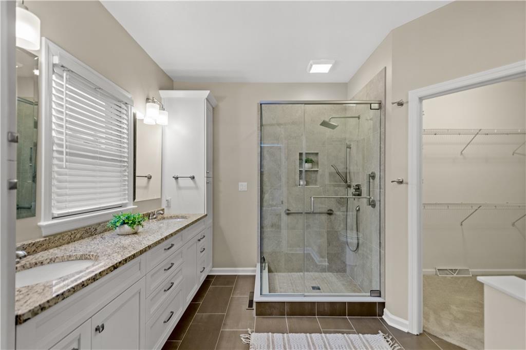 2510 Hilltop Road Presto, PA 15142 - Photo 19 of 36 a bathroom with a shower sink and mirror