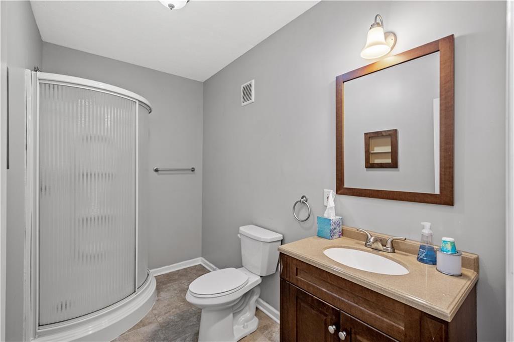 2510 Hilltop Road Presto, PA 15142 - Photo 29 of 36 a bathroom with a sink toilet and vanity