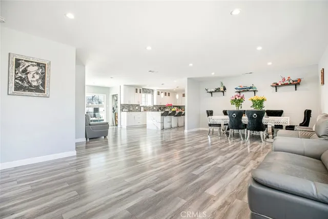 a kitchen with a sink cabinets and white appliances
