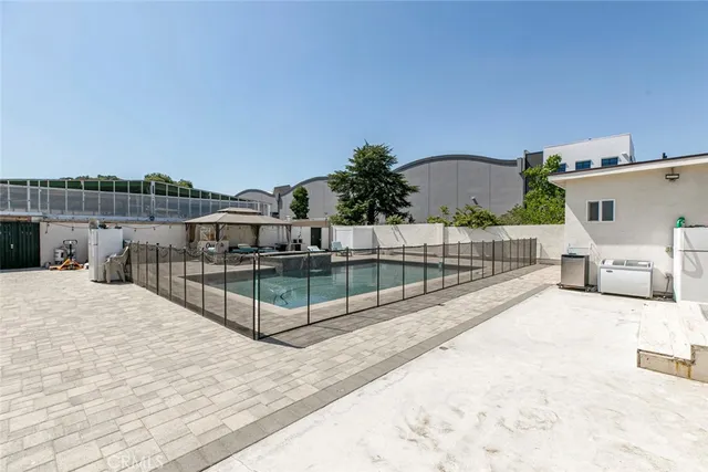 a view of a house with swimming pool