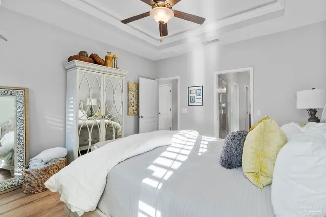 a bathroom with double vanity sinks and a mirror