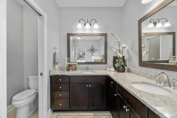 an empty room with closet and ceiling fan