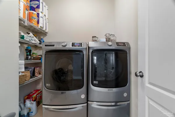 a view of hallway with wooden floor