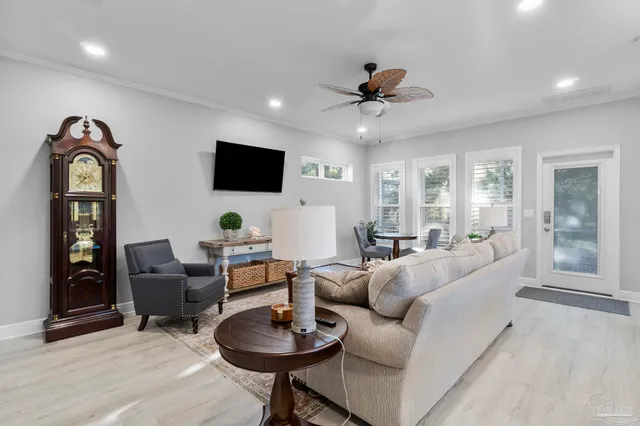 a aerial view of a house next to a yard