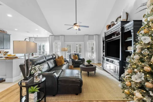 a living room with furniture and a window