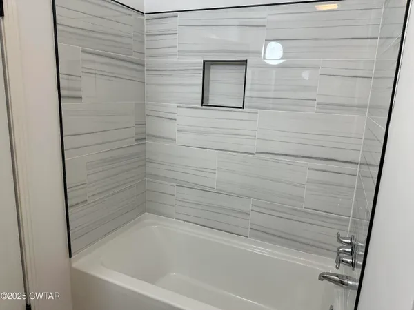 a bathroom with a bathtub