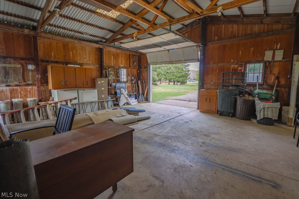 51883 Telegraph Road Amherst, OH 44001 - Photo 33 of 49 Garage featuring wooden walls