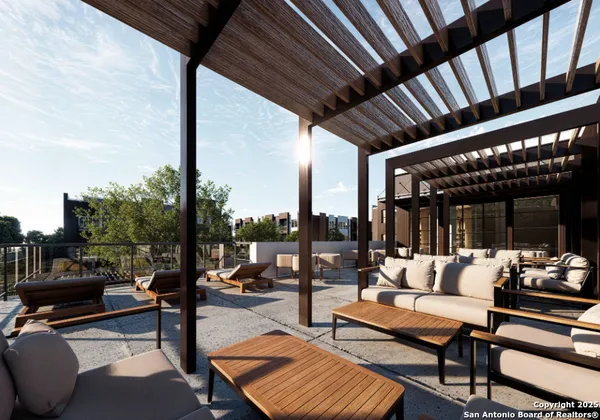 a outdoor living space with patio furniture and a potted plant