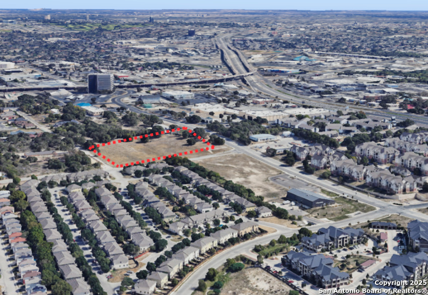 5135 Wurzbach Road, Unit 802 San Antonio, TX 78238 - Photo 6 of 14 an aerial view of residential houses with outdoor space