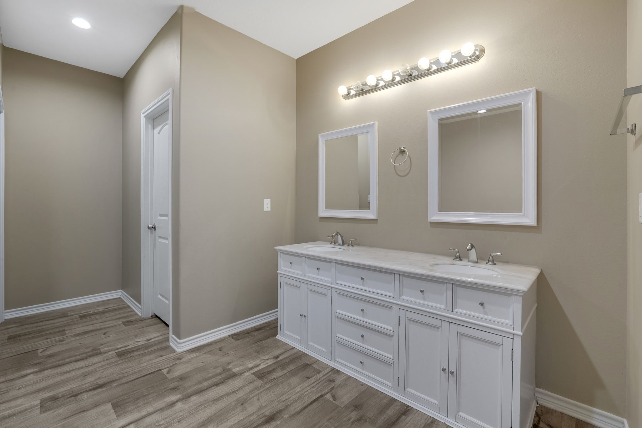 97 Harrell Road Coldspring, TX 77331 - Photo 14 of 31 The primary en-suite has dual sinks