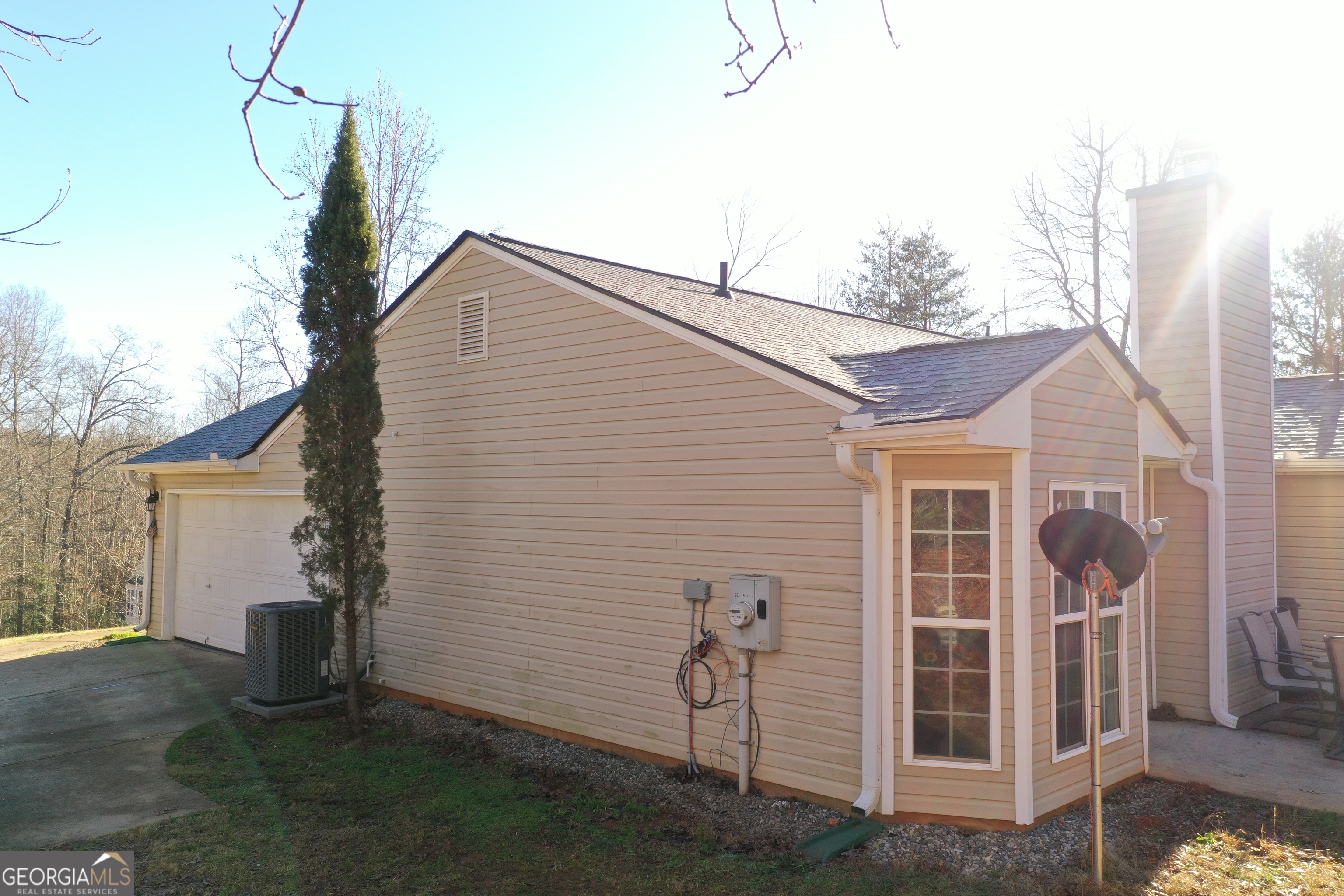 520 Redbud Lane Mount Airy, GA 30563 - Photo 23 of 26 a view of a house with a yard