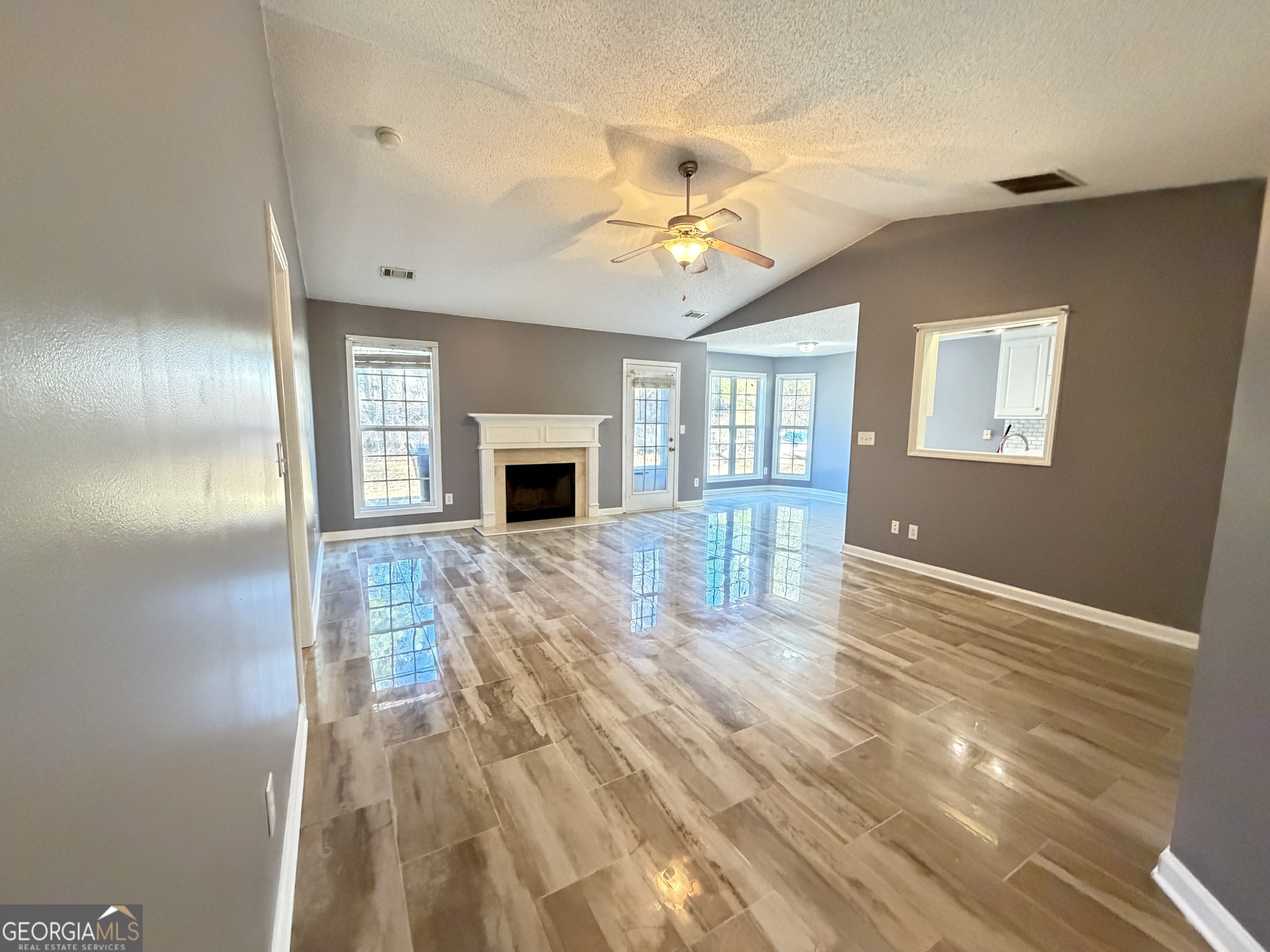520 Redbud Lane Mount Airy, GA 30563 - Photo 4 of 26 a view of empty room with wooden floor