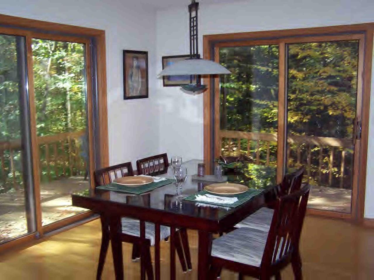 222 Thicket Road Tolland, MA 01034 - Photo 5 of 6 a view of a dining room with furniture window and outside view