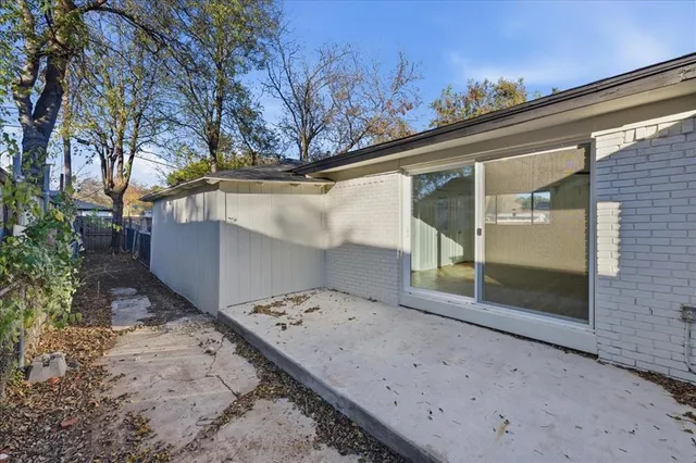 front view of a house with a dry yard