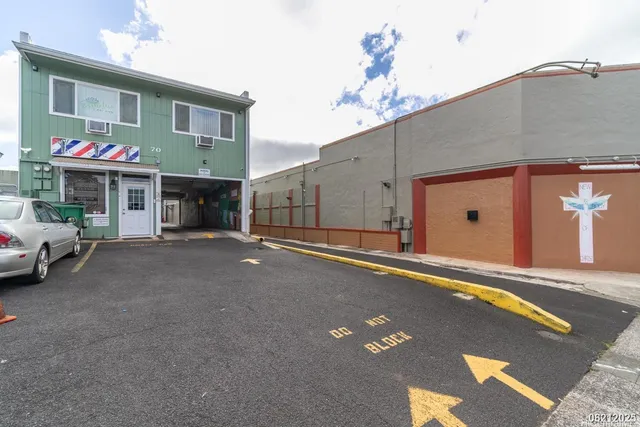 a view of a house with a street