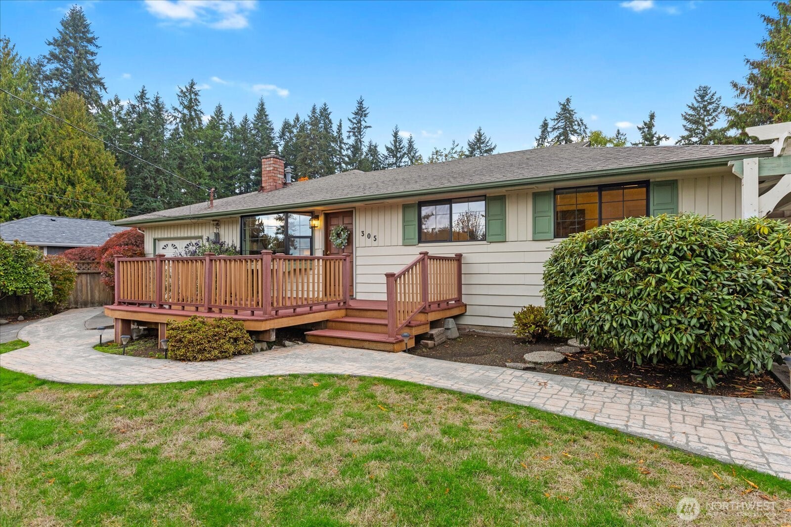 305 234th Street Southwest Bothell, WA 98021 - Photo 2 of 40 a view of a house with backyard and sitting area