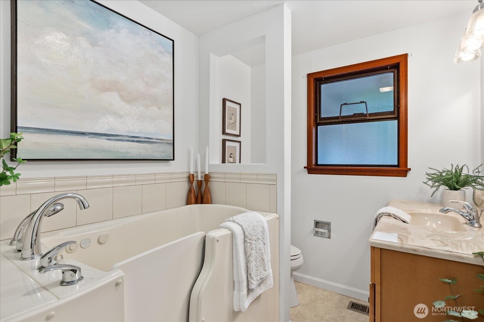 305 234th Street Southwest Bothell, WA 98021 - Photo 25 of 40 a bath room with a sink and a mirror