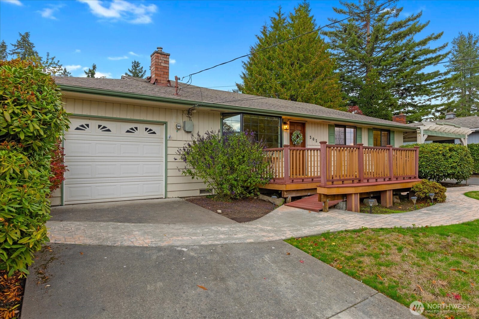 305 234th Street Southwest Bothell, WA 98021 - Photo 3 of 40 a view of a house with backyard and sitting area