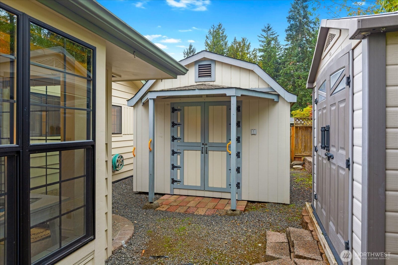 305 234th Street Southwest Bothell, WA 98021 - Photo 32 of 40 a front view of a house with a glass door